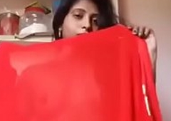 Hot Tamil desi saree aunty with navel reverberate expose chubby navel in saree