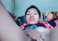 Nepali girl rubbing her hairy pussy