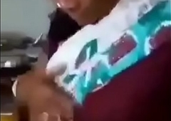 Indian Aunty is showing her boobs to nephew. Nephew is capturing it and hardcore  kissing her.