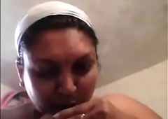 Tamil aunty in bathroom sucking her boobs