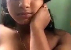 Beautiful girl shows the brush chubby knockers on video call