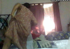 Indian Bengali Aunty Mili captured changing in bedroom