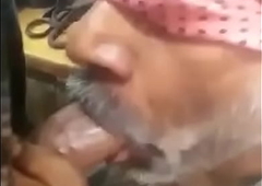 Indian uncle hulking blowjob in a shop