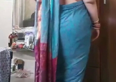 Indian stepmom teasing stepson with beamy ass