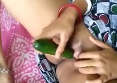 Sexy indian bengali boudi masturbating with cucumber