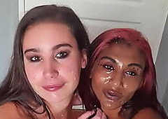 Mixed race LESBIANS covering up each others faces with SALIVA as A well as A sharing soiled tongue kisses
