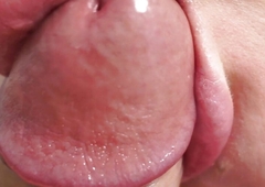 Close-up blowjob surrounding cum in mouth and swallowing
