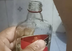 Bhabi pissing forth rum bottle