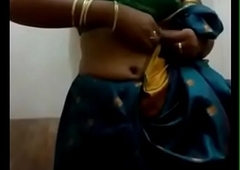 VID-20140201-PV0001-Sivakasi (IT) Tamil 20 yrs old unmarried beautiful, hawt coupled with sexy girl Ms. Nandhini S. B.Sc., Chemistry, 2nd yr undressing her saree back her home after audience a union function coupled with this coddle recounting it back her mobile phone sex porn photograph