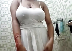 Desi girl dancing in shower and showing her big boobs in bathroom.