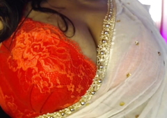 Hot desi girl is having pastime by showing her youthful jugs to men.