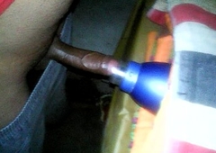 Indian boy thrusting his dick in bottle