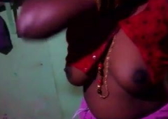 Madurai hot tamil aunty wearing saree with the addition of jacket